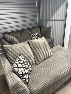 Grey couches basically new only used for less than a month
