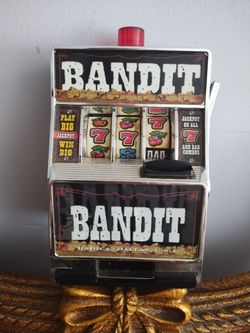 Mini slut machine with coin