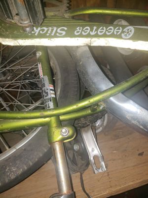 Photo Old cheater slick huffy 1 tire no chain original grips. Not a banana seat