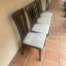 4 Wooden Chairs In Great Condition 