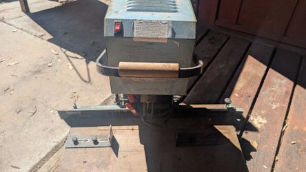 Tabletop paper drill.
