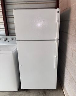 White GE Refrigerator And Freezer