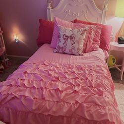 Disney twin bow bed with mattress