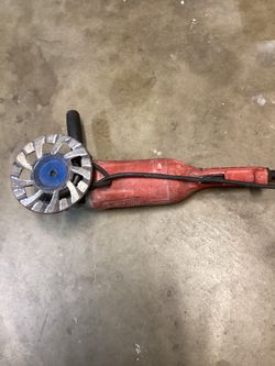 Grinder Milwaukee with concrete grinding cup