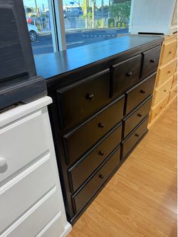 Black pinewood dresser 9 drawers