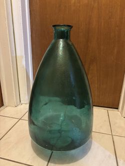 Large glass vase See all pictures approximately 24”H Some blemishes inside Great for change