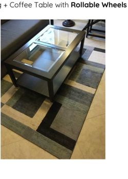 Coffee table with rollable wheels