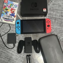 Nintendo Switch With Mario Wonder And Case