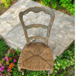Vintage French Country style ladderback chair set of 4 w/ a rush woven seat and a distressed finish.