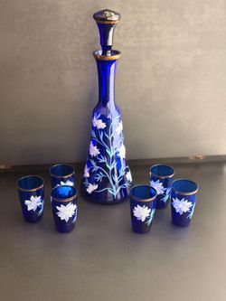 7-Piece Cobalt Blue Hand-Painted Floral Liqueur Decanter Set.