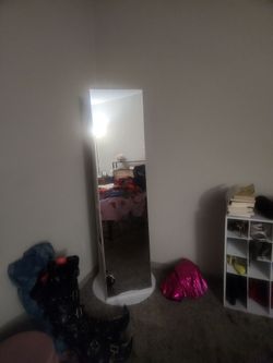 Full length mirror with storage