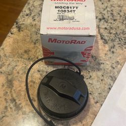 Motored Fuel Cap With Tether