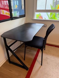Small black desk and chair