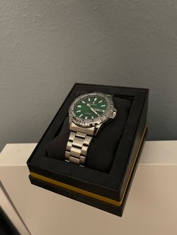 Luxury green dial wristwatch