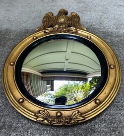 Federal or Regency style eagle gilt wood convex wall mirror