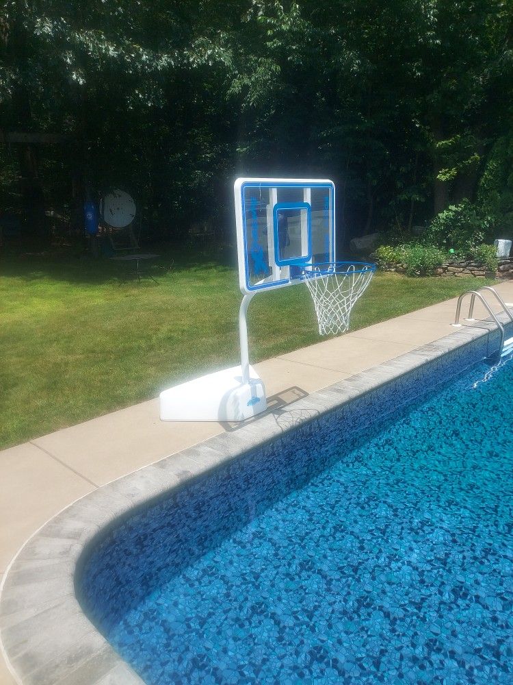In ground swimming pool basketball hoop