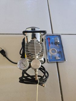 Small air compressor and airbrush