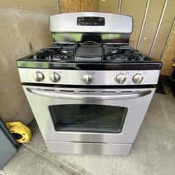 GE gas stove 5 burners stainless st with griddle.  30”