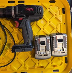 SKIL drill with charger and 2 batteries