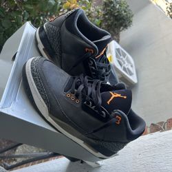 Black/grey/orange Jordan 3s