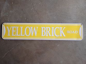 YELLOW BRICK ROAD Tin Sign $1