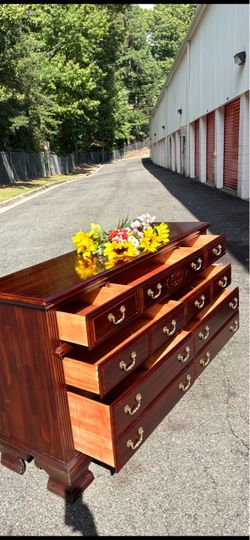 Solid wood long dresser with big drawers. Drawer sliding smoothly