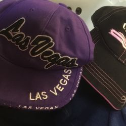 Two Hat One Says  Las Vegas Nevada Color purple Trim In Black One bought On Carnival Ship Beautiful Cap Color Black Trim With Hot Pink