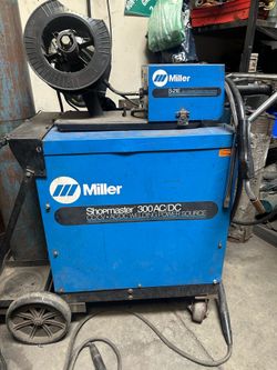 Miller Shopmaster 300 AC/DC welder in great working condition.