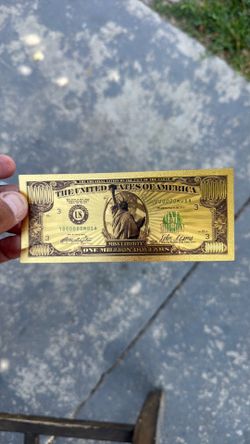 Decorative gold million dollar bill
