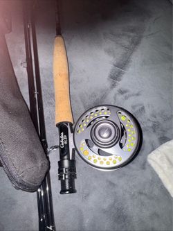 Cabela’s fly fishing rod and reel and case 77407