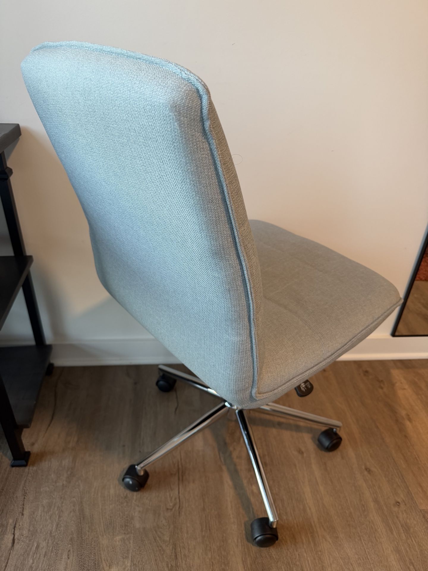 Grey rolling desk chair