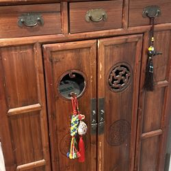 This item appears to be a vintage or antique Chinese-style rosewood or elm sideboard,