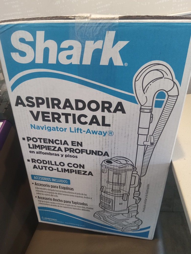 Brand new  Shark vacuum in the box Never open