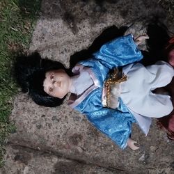Oriental Porcelain Kneeling Doll in Komono and Obi Holding A Fan