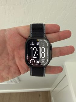 Apple Watch Ultra 3 GPS + Cellular, 49mm Black Titanium with Charcoal Trail Loop - M/L
