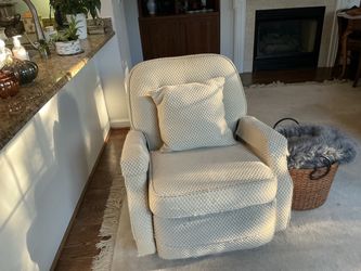 FREE SWIVEL/RECLINER CHAIR.