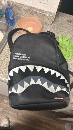 Spray ground backpack