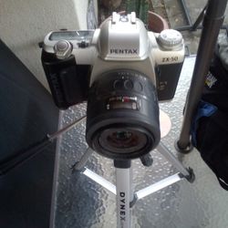 Pentax Camera And Tripod 