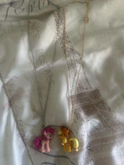 My little pony pinkie pie and apple jack necklaces