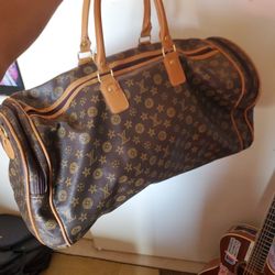 Louie Vuitton Duffle Bag