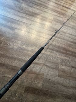 Like new Daiwa Proteus 7’ heavy spinning salt water fishing rod.