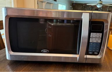 Oster 1.3 cu ft, 1100 watt microwave