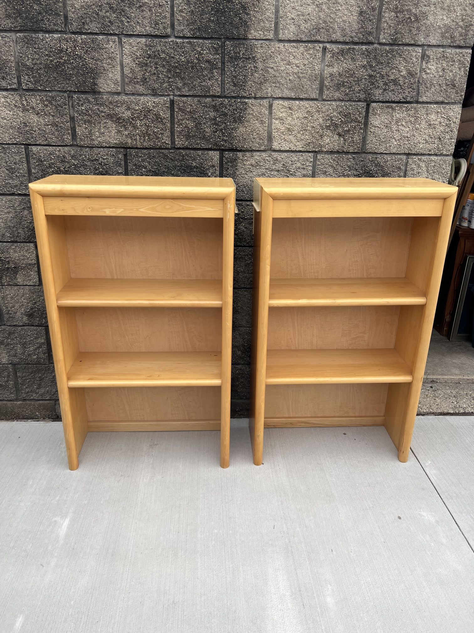 matching blonde bookshelves