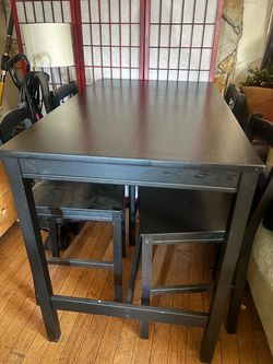 Bar height table and chairs