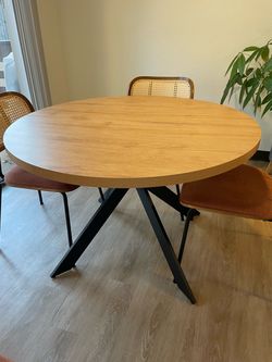 Round Dining Table with Black Metal Legs