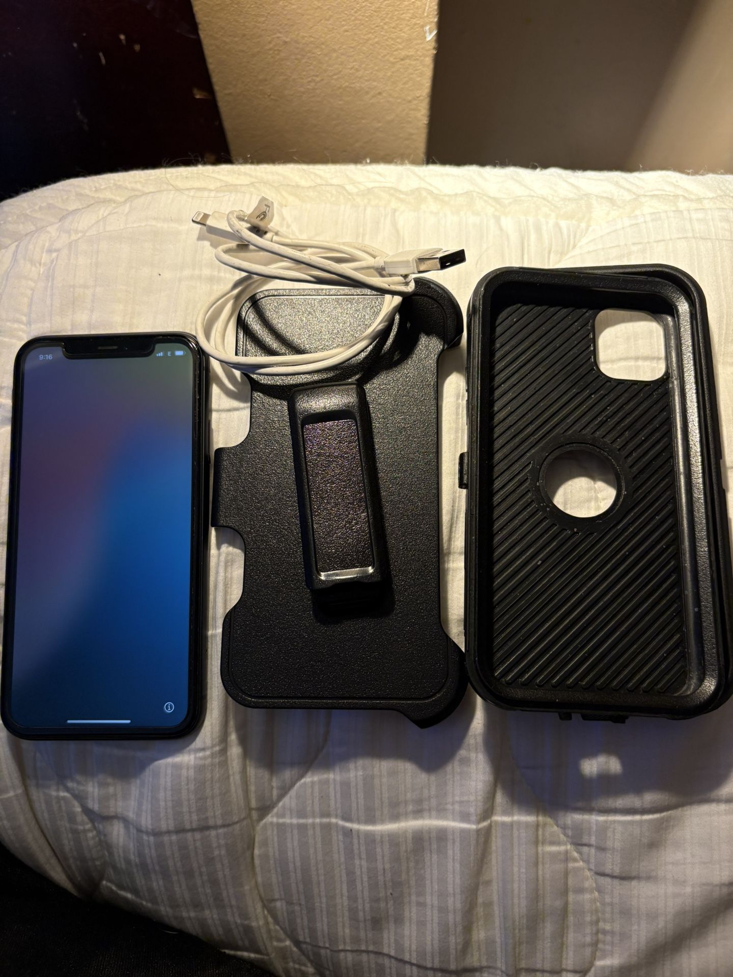 iPhone 11 With Case, Holster, And Charger