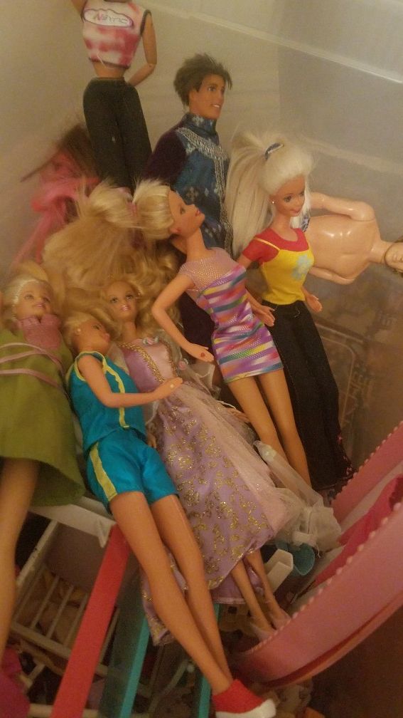 10 plus barbies with lots of accessories one box full