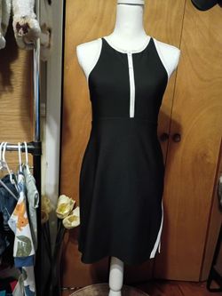 Black and White Sleeveless Zip-Front Dress, active wear. Built in shorts with pockets