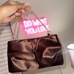 Brown satin clutch purse with gold strap
