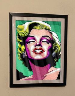 Custom art piece of Marilyn Monroe on black frame